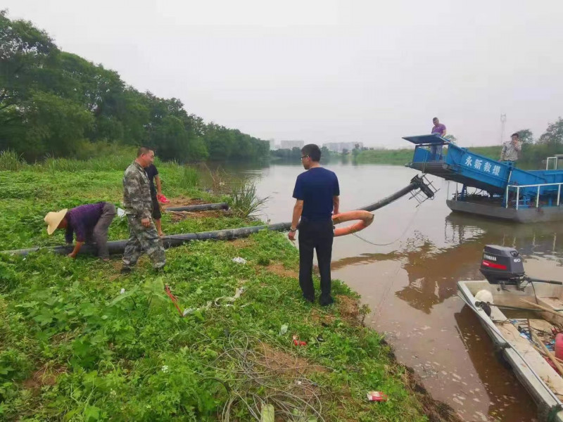 去年5月，永新村新建了地埋式抗旱电排，在捞刀河取水。受访者供图